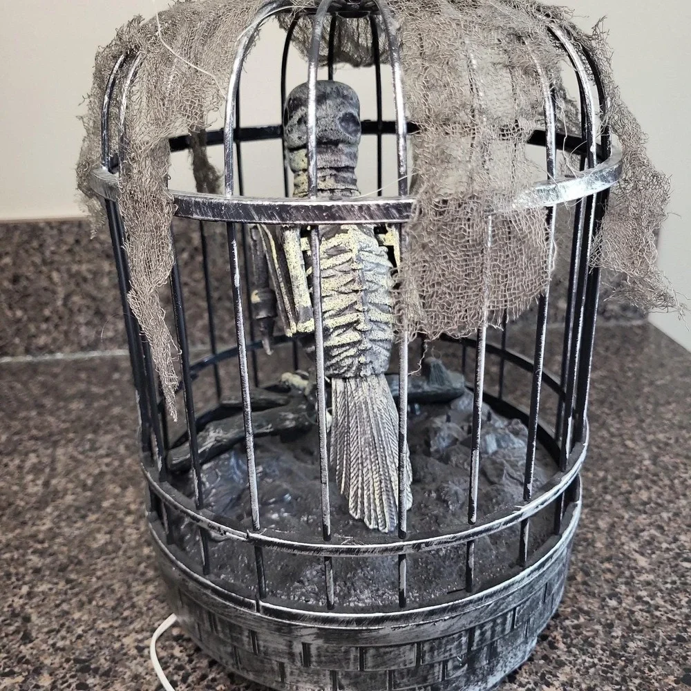 Spooky Village Animated Talking Skeleton Zombie Parrot in Cage Halloween Motion